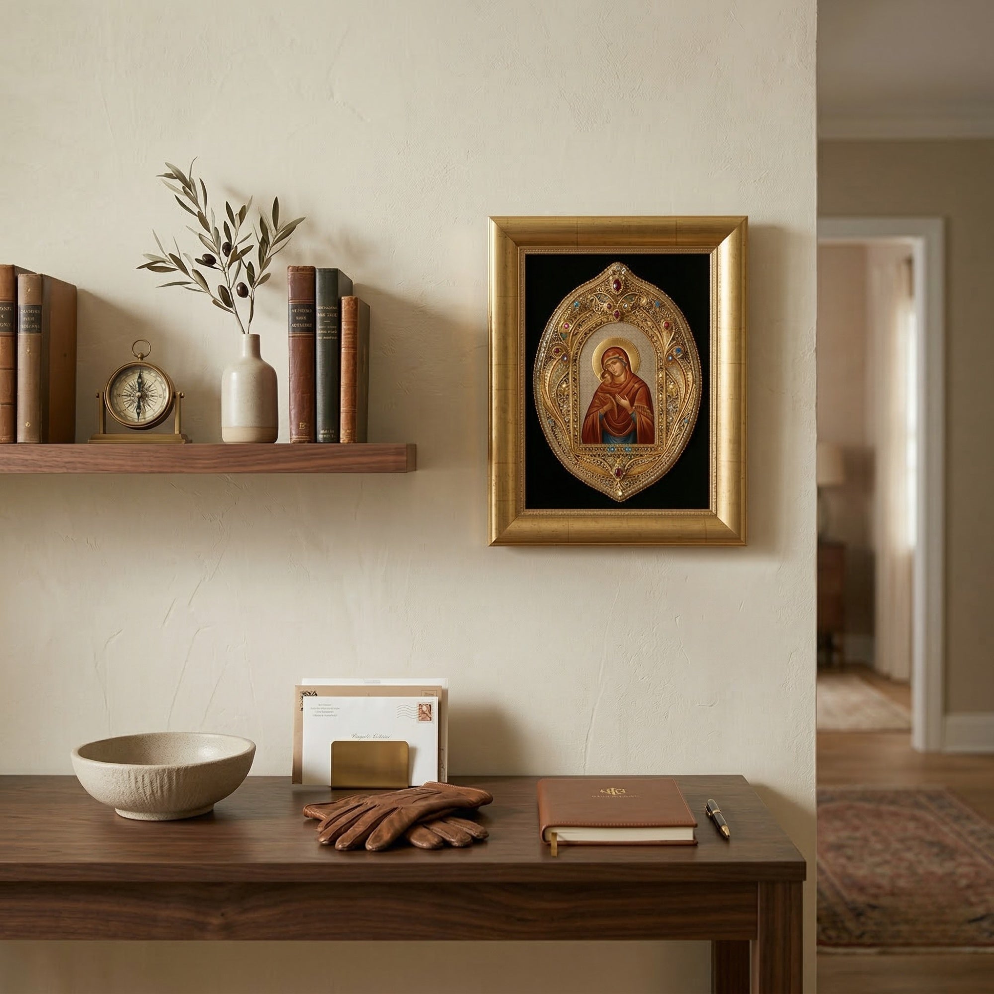 Рачно изработена икона Пресвета Богородица од срма поставена над дрвена комода во светол простор.