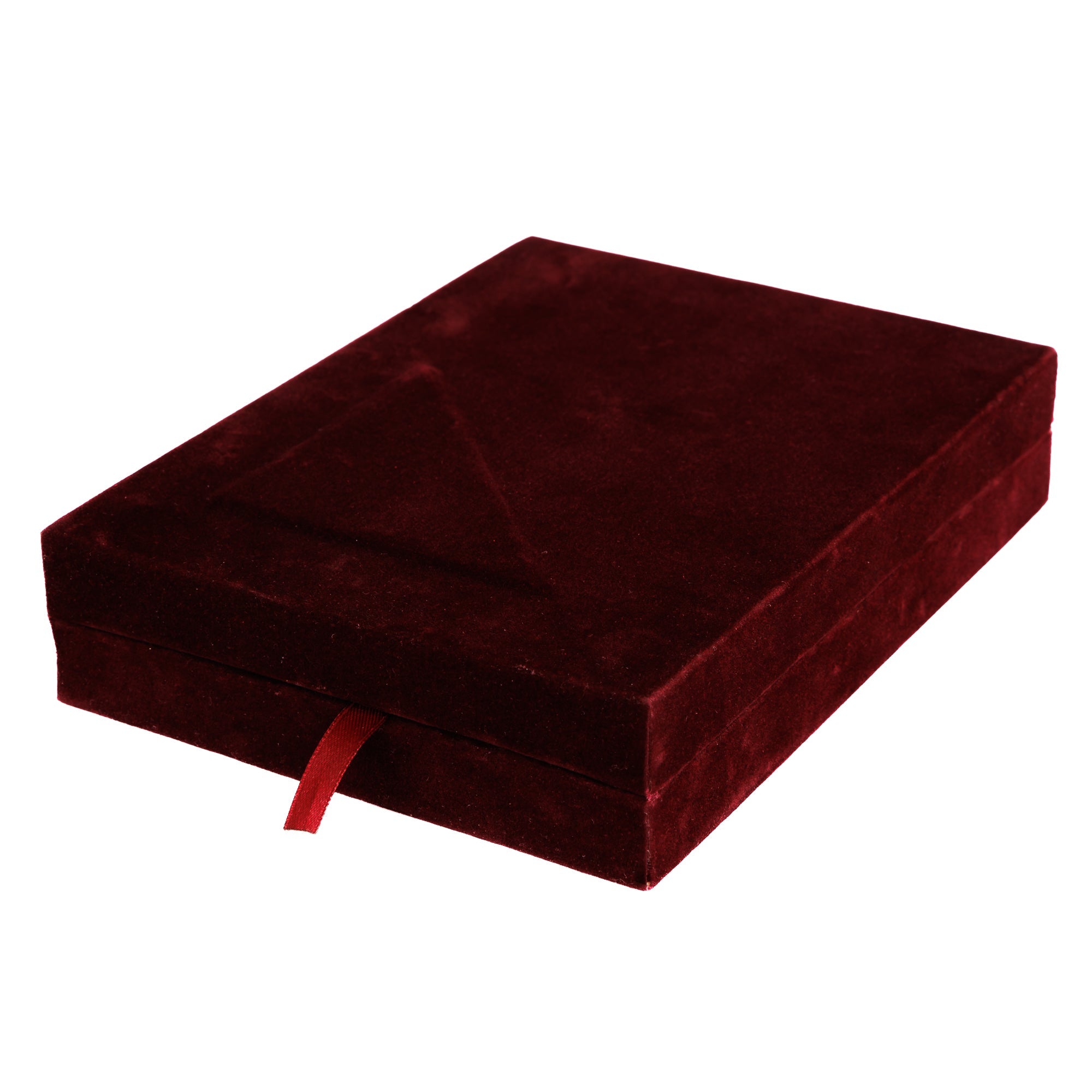 Затворена бордо кадифена кутија во која е безбедно сместена Златната Маска, подготвена како ексклузивен деловен подарок за странски делегации и колекционери.